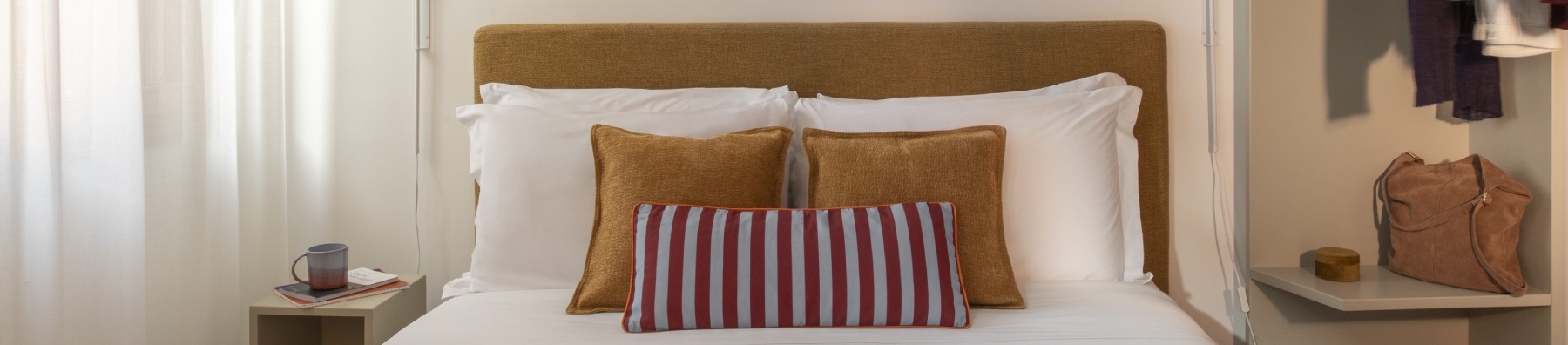 Close-up of a Standard double bed with elegant pillows